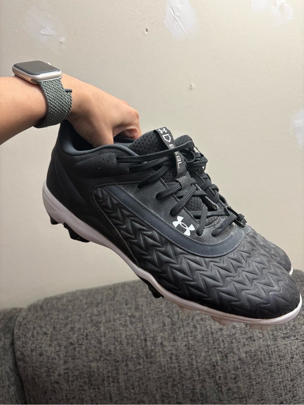 Under Armour Men’s Black Athletic Cleats with White Accents